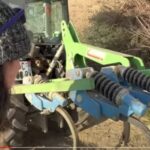 Conduite du New Holland et passage du cadre dans les vignes